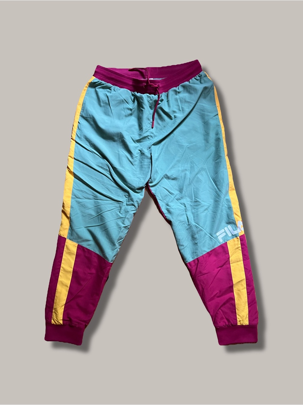 FILA Unisex Colorblock Windbreaker Joggers - Teal, Magenta & Yellow